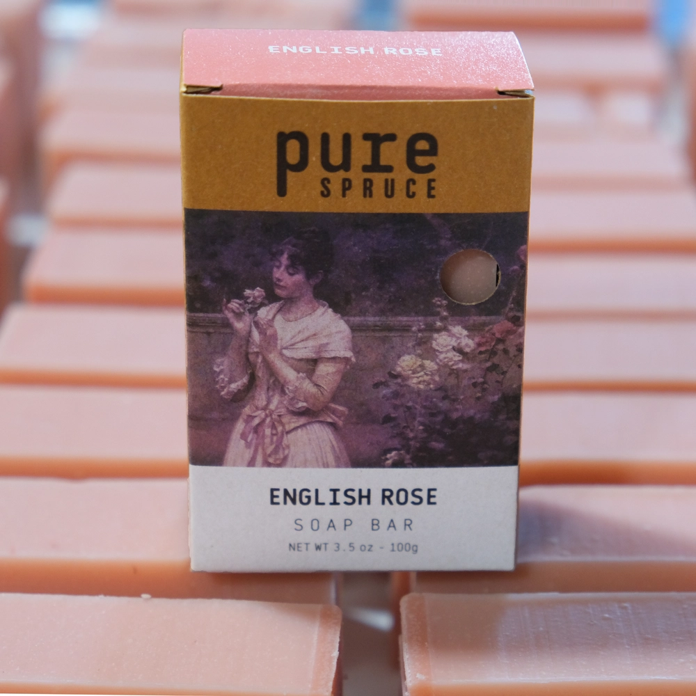 English rose soap bar in box on top of soaps