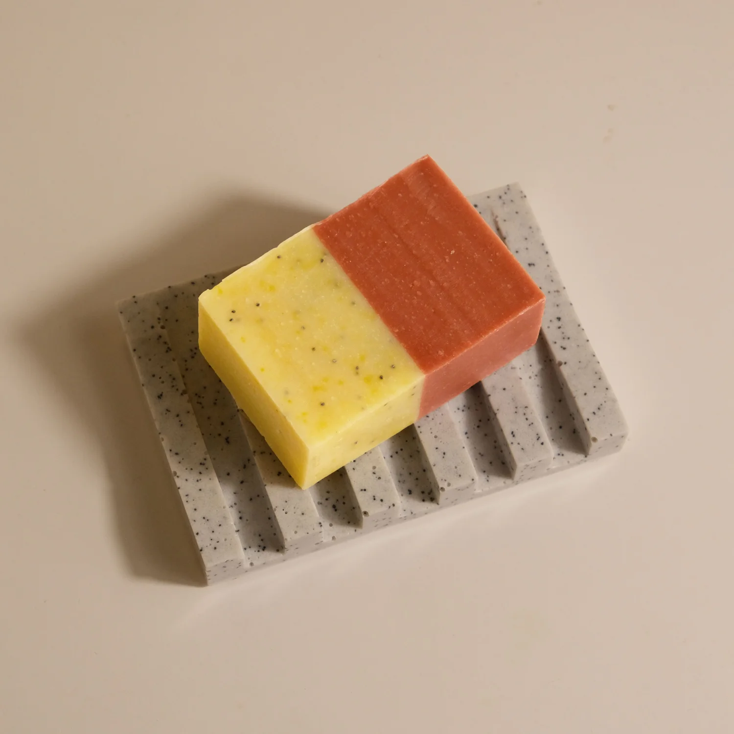 Citrus burst soap bar on white soap tray by pure spruce